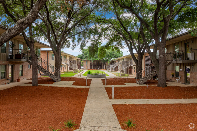 Oak Grove with Pecan Shell Mulch - Dot Commons Apartments