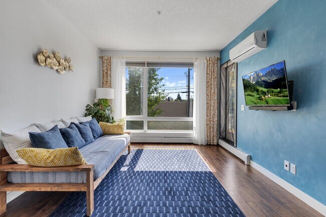 Building Photo - 607 17 Av NW Unit 205