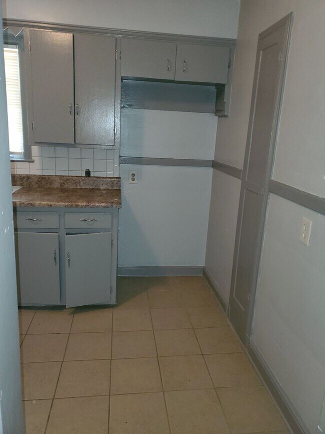 Photo - 4 Success is offering this beautiful 2 bedroom 1 bath with formal dining. The home features hardw...
