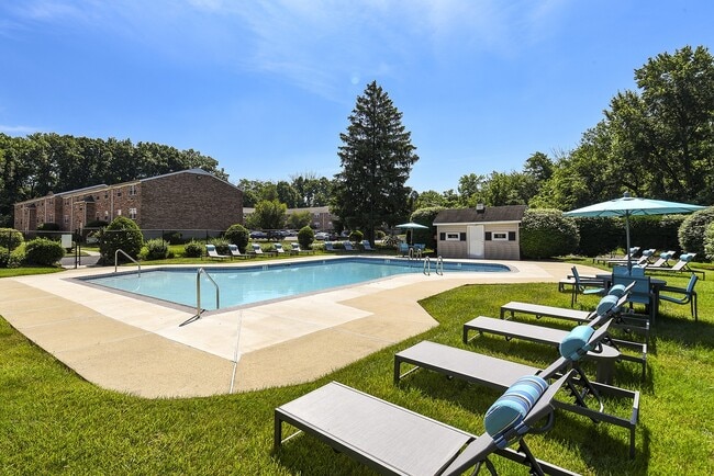 Outdoor pool with lounge chairs