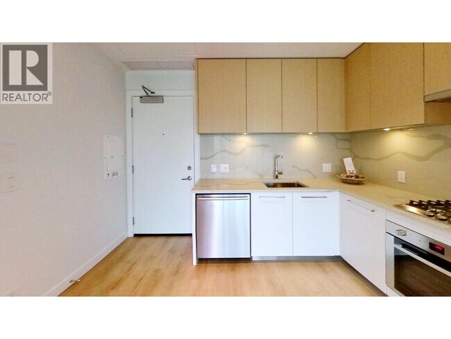 Photo - 567 Clarke Rd Unité 9xx