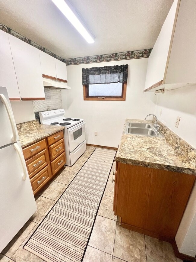 Building Photo - 209 E Wynoka St Unit Apt #4