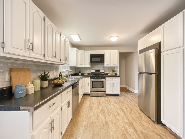 Photo - Stunning 4-Bed, 2.5-Bath Corner Lot Home with Modern Upgrades & Detached Garage – Move-In Ready!