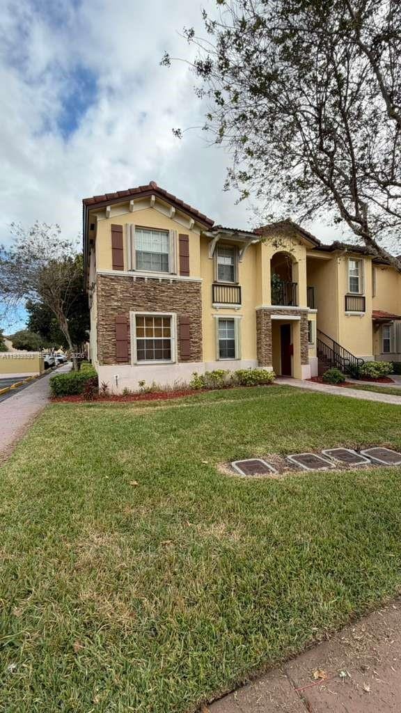 Building Photo - 1555 NE 33rd Rd Unit 1012