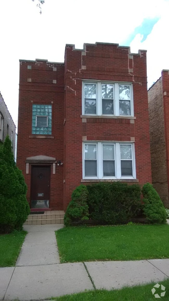 Building Photo - 5902 W Wilson Ave Unit 1st FL Rental