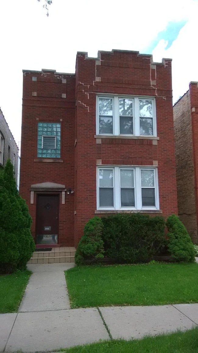 Building - 5902 W Wilson Ave Apartments Unit 1st FL