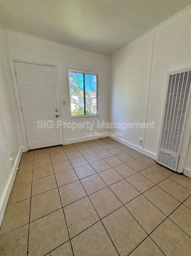 Photo - 10156 Helendale Ave