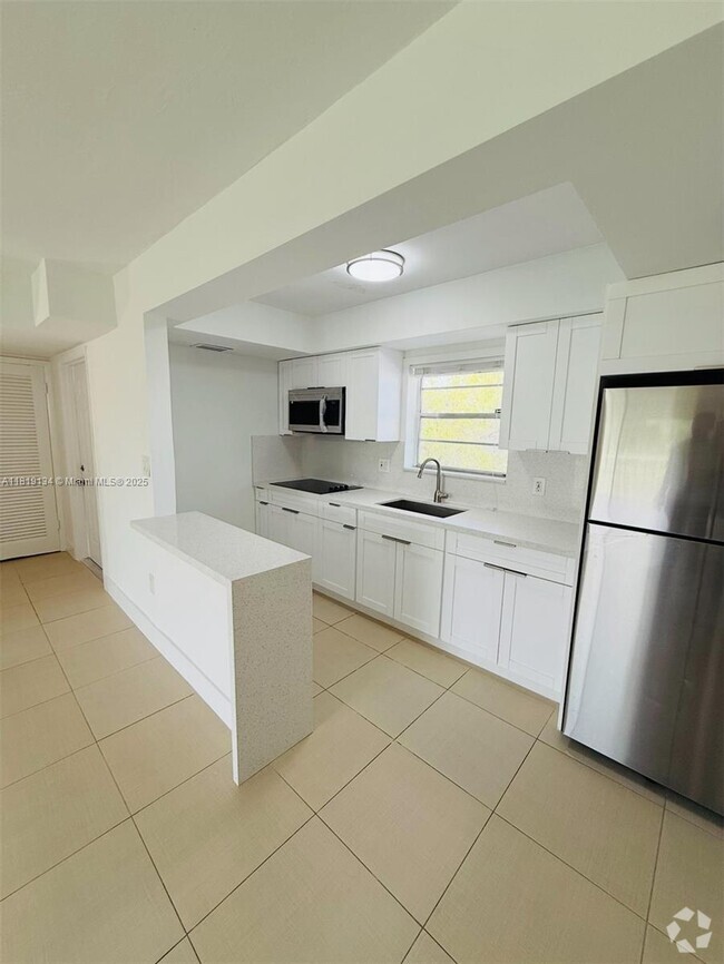 Building Photo - 7580 SW 82nd St Unit F217 Rental
