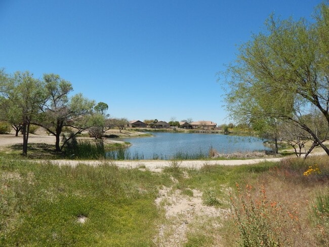 Building Photo - AVAILABLE NOW! Swimming - Fishing - Biking and so much more