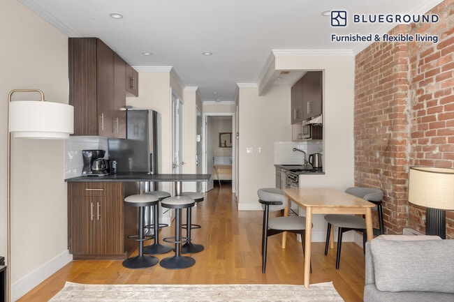 Photo - 515 W 47th St Unidad SI FL4-ID1989