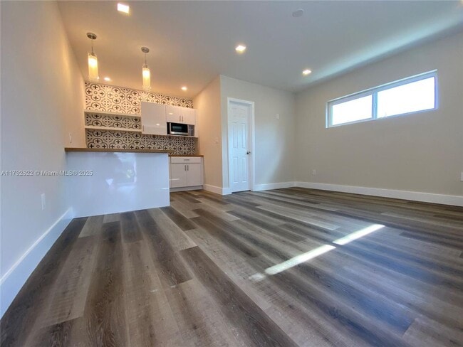Building Photo - 1170 NW 58th St Unit 1-1 Rental
