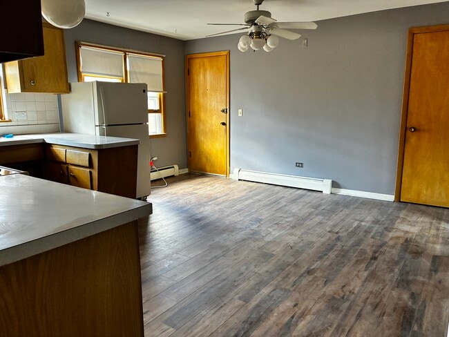 Spacious, well-designed kitchen with a dedicated dining area—perfect for everyday living. - 3515 S Harlem Ave Unit 6B