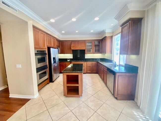 Photo - Elegant 5 Bedroom Home With Sweeping Staircase and Tons of Space!