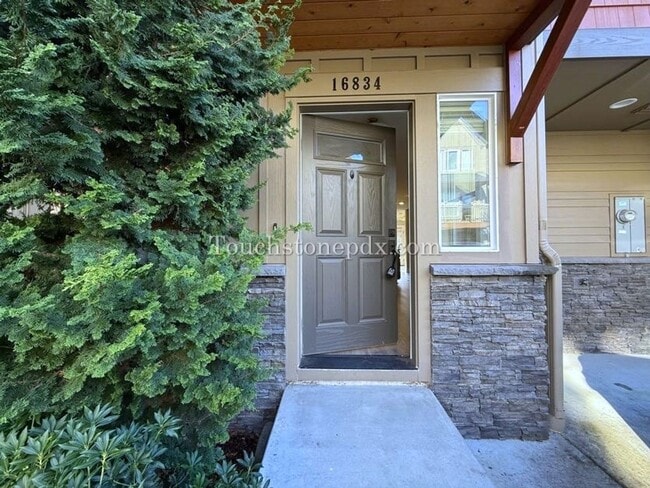 Photo - Modern Open Concept 3 Bedroom Home with Balcony and Attached Garage