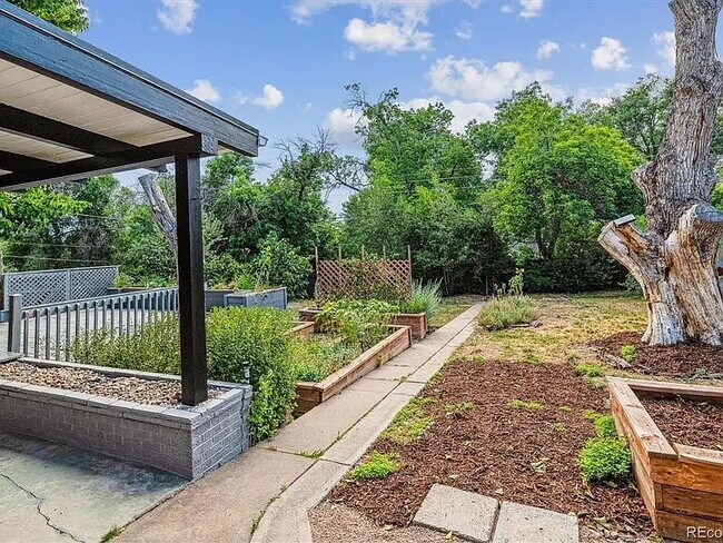 Photo - Quiet, Tree-Shaded Mid-Mod Steps to Downto...