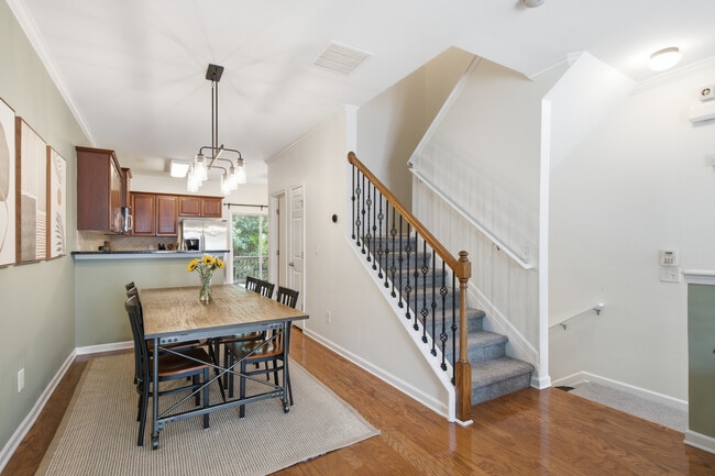 Dining room + access to upstairs bedrooms - 1225 Liberty Pky NW