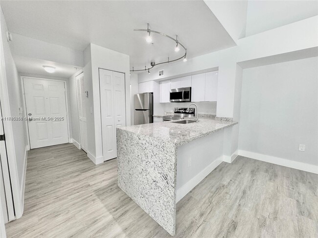 Building Photo - 677 SW 111th Ave Unit 303