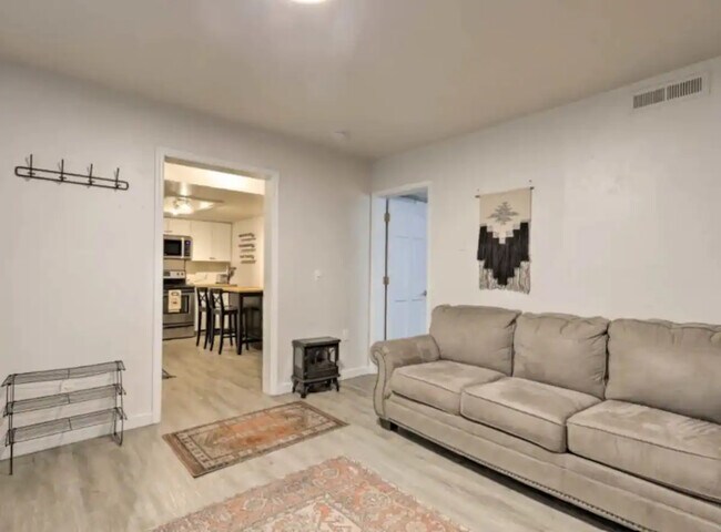 Living room - 3440 S Walkup Dr Unit Apartment in the Pines