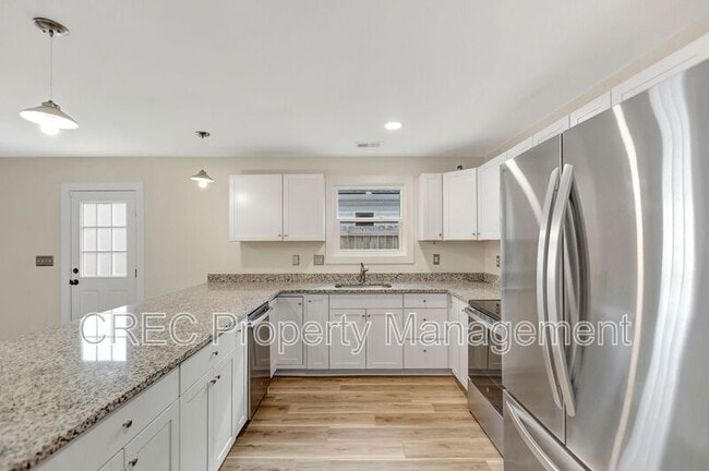 Photo - 6961 Raymond Ave