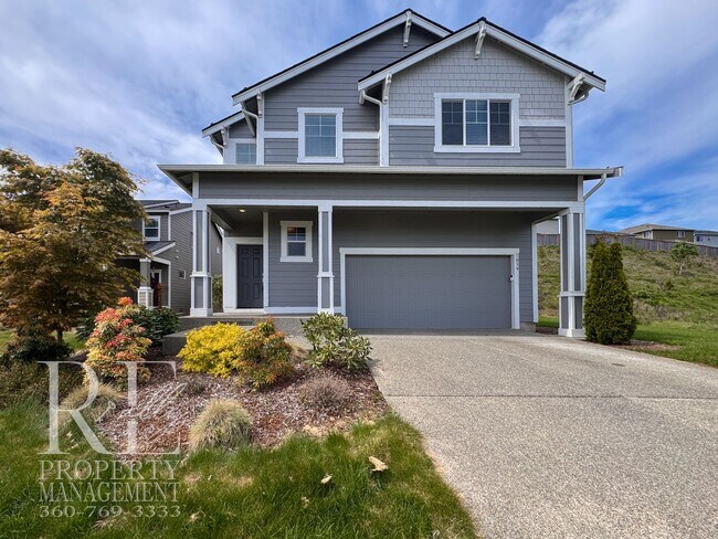 Photo - Warm & Inviting 4-Bedroom Home with Vaulted Ceilings, Loft, Fireplace & Fenced Backyard