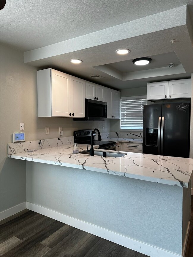 Photo - Renovated 2 Bedroom, 2.5 Bath with Washer and Dryer Plus A/C. MUST SEE!!!