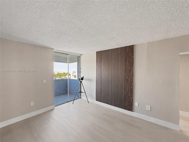 Building Photo - 5050 NW 7th St Unit 705