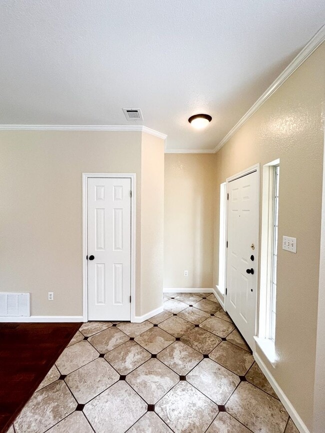 Photo - Available NOW!!!! This beautiful 2 story, 4 bedroom, 2 bath, two car garage with garage door open...