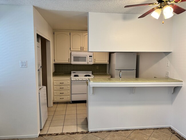 Photo - ONLY $1,500 PER MONTH FOR THIS SUPER CUTE , SPACIOUS 2 BEDROOM / 1 BATHROOM CONDO CENTRALLY LOCAT...