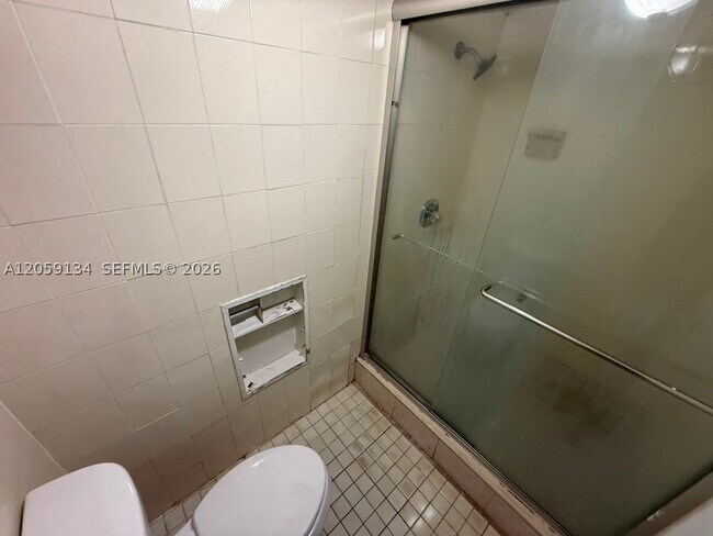 Photo - 1325 W 68th St Unit 111