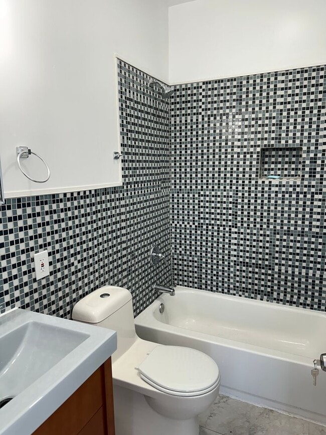 Photo - Newly Renovated, Spacious Home! W/D Hook-Up, Close to JHU, KKI and Public Transportation! Availab...