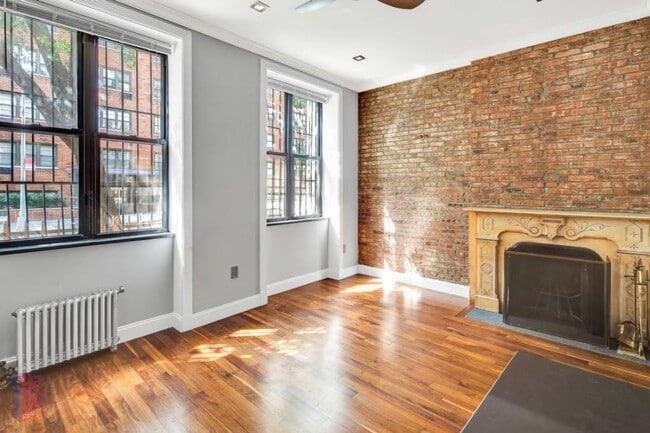 Building Photo - E 58TH ST. Unit A