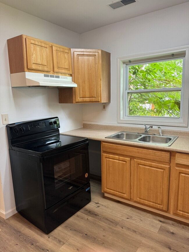 kitchen - new range - 306 S State St Unit 1