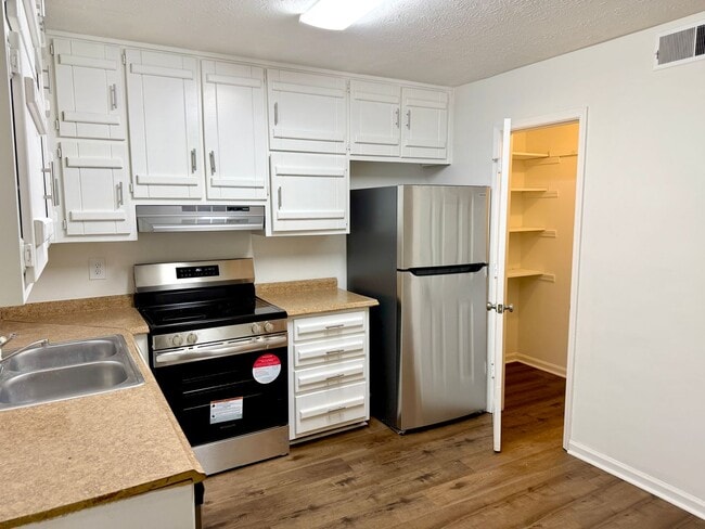 Photo - Welcome to this charming 2-bedroom, 2-bathroom home located in the heart of Fayetteville, GA.