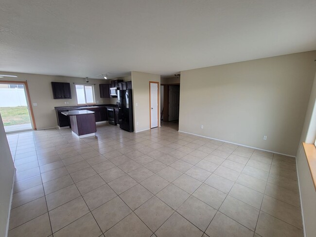 Photo - Comfortable 4-Bedroom Home with Fenced Bac...