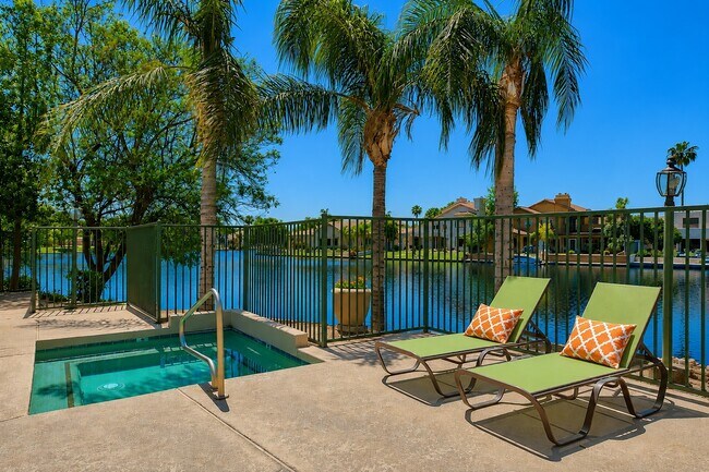 Elevate your lifestyle at Serena Shores with our stunning poolside oasis. Relax under swaying palms and enjoy the serene water views. Your perfect retreat awaits—schedule a tour today to envision your new home!