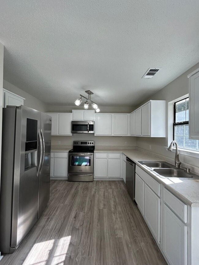 Photo - 3-Bedroom, 2-Bath Home on almost an 1 Acre – Pet-Friendly!