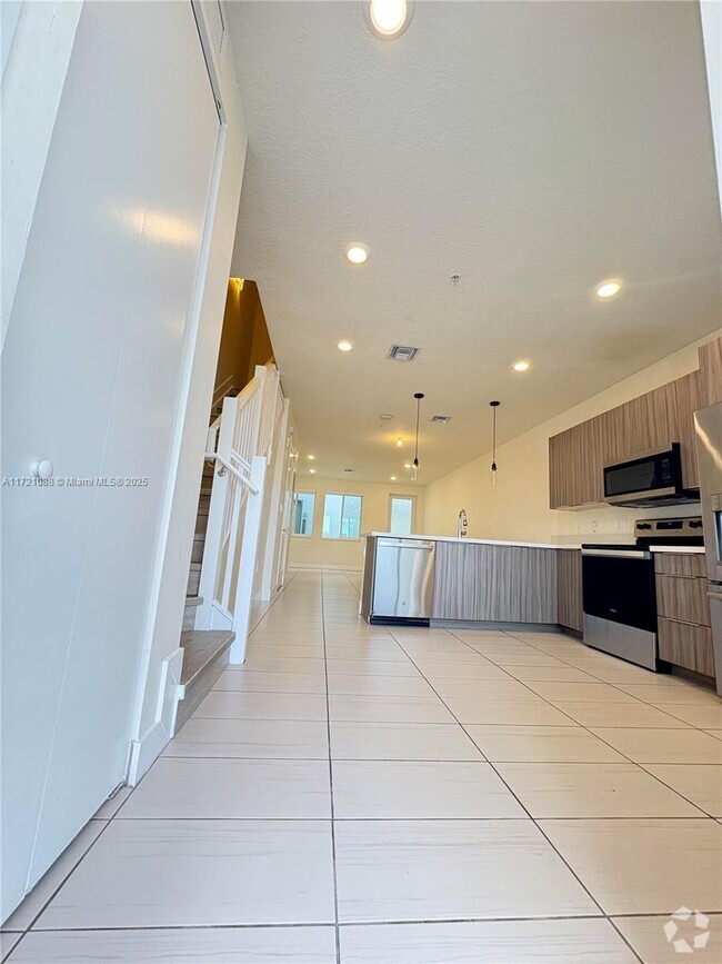 Building Photo - 6450 NW 102nd Ct Rental