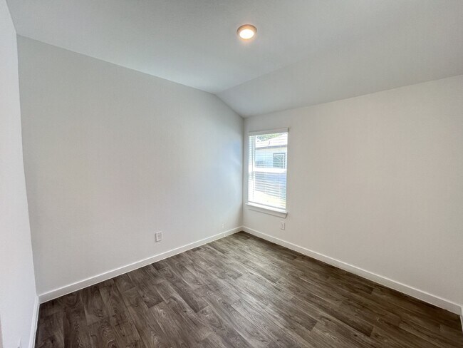 Photo - Modern 4-Bed Home with Office in Fosters Ridge Near The Woodlands | Open Layout & Resort-Style Am...