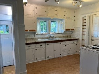 New Bosch Refrigerator, gas stove, spice cupboard, new counter top & sink
