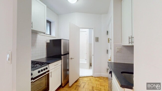 Building Photo - 405 W 50th St Unit 4C Rental