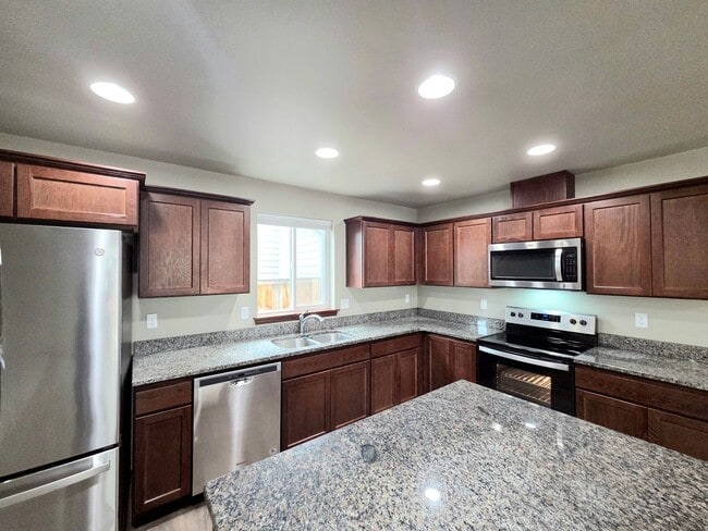 Photo - 3-Bed, 2.5-Bath Townhome w/ 2-Car Garage