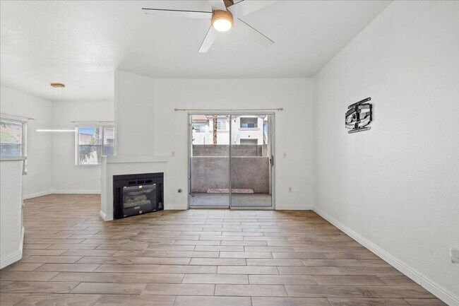 Photo - Charming 2-Bedroom First Floor Featuring Open Layout, Fireplace, Patio & Community Pool