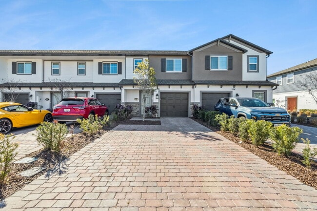 Building Photo - Stunning 3 bedroom, 2.5 bathroom townhome located in a highly desirable gated community