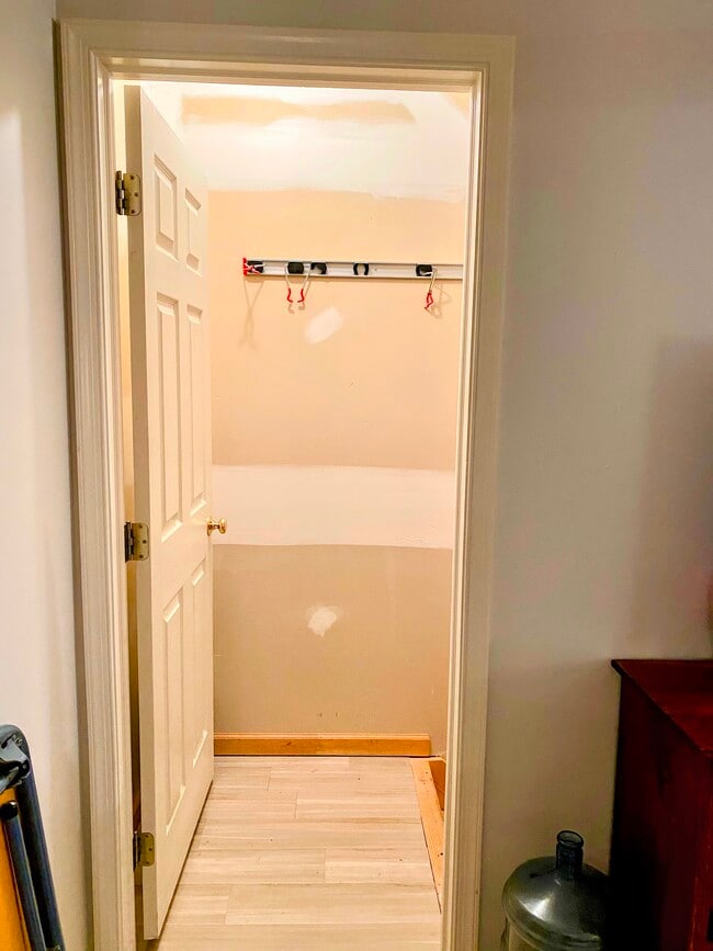 Landing to unfinished basement - 24 Sandstone Ct