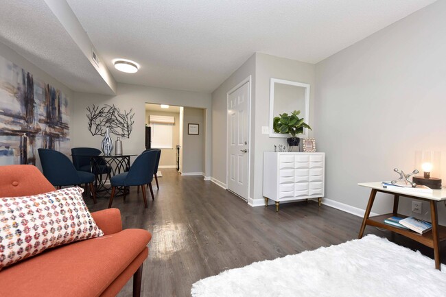 Dining Room + Hardwood Style Flooring - The Kendall Apartments