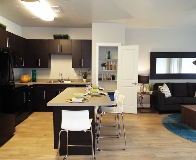 Sala de estar Enclave Apartments - Enclave at 1400 South Apartments