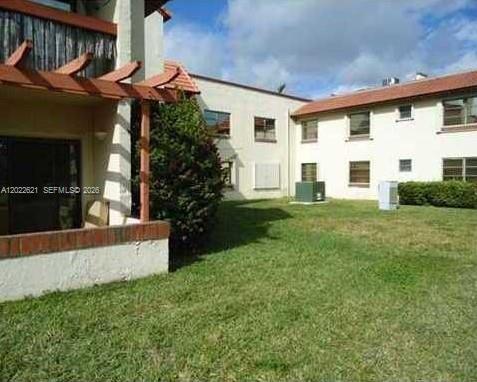 Building Photo - 8650 SW 149th Ave Unit 305
