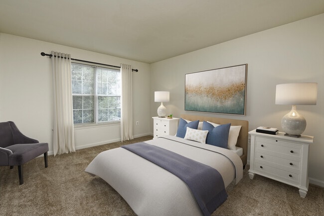 Bedroom with carpeted flooring