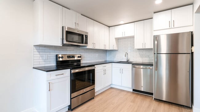 Kitchen with Stainless Steel Appliances - Redmond Court