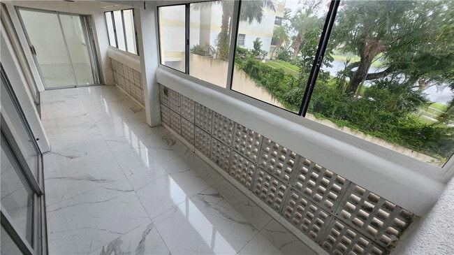 Building Photo - 3301 Spanish Moss Terrace Unit 202